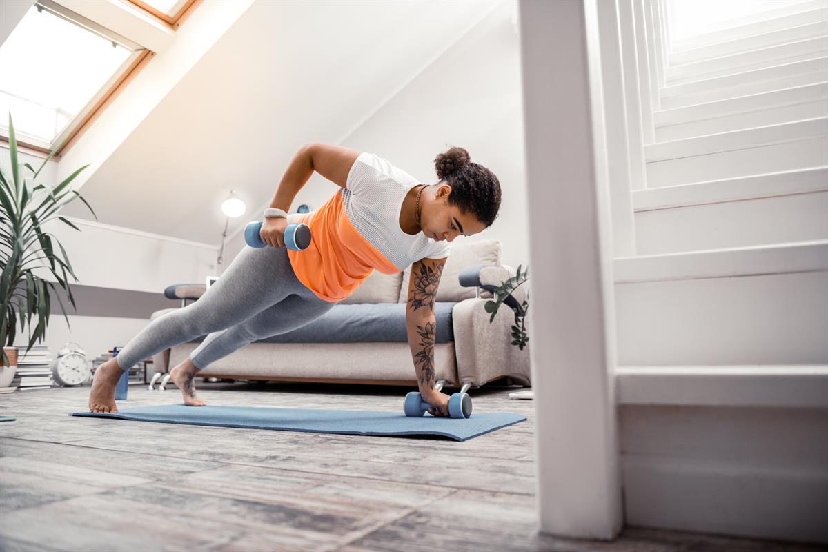 A girl doing workout at home