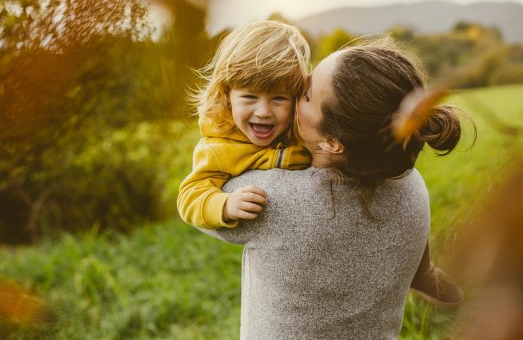 A mother holding her child