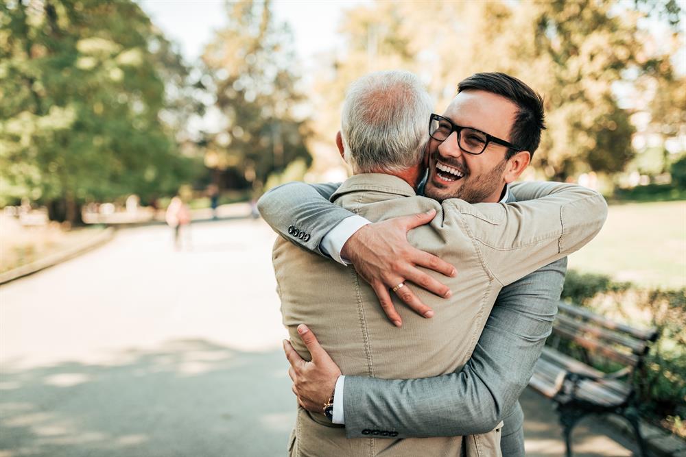 A man hugging his friend